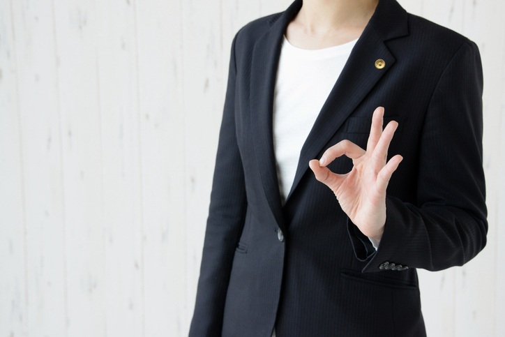 Japanese female lawyer with OK sign